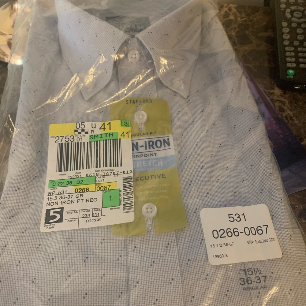 Men’s dress shirt. Never worn, still in package.